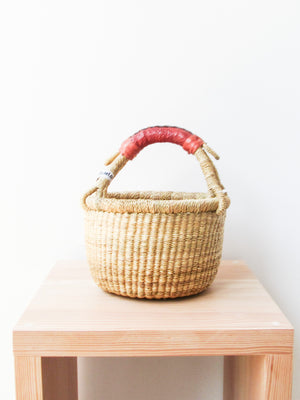 
                  
                    Natural Mini Round Basket (leather handle)
                  
                