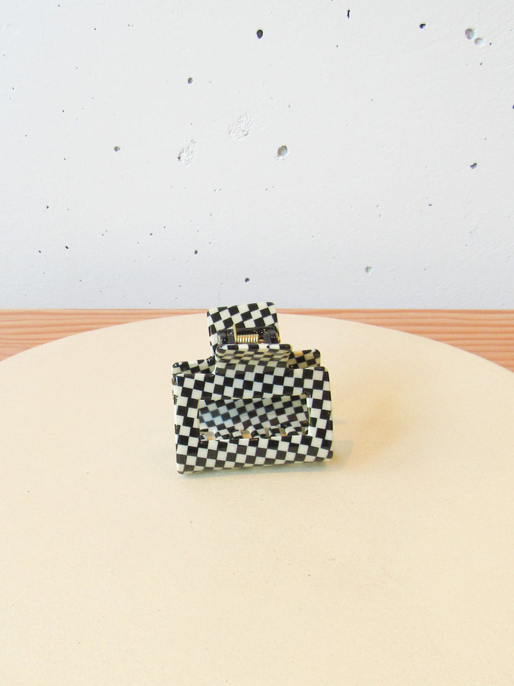 
                  
                    Black Checkered Claw Clip
                  
                